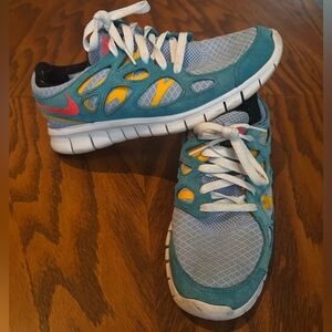 Men’s Nike Freerun 2 Turquoise and Yellow. Size Men’s 8.5